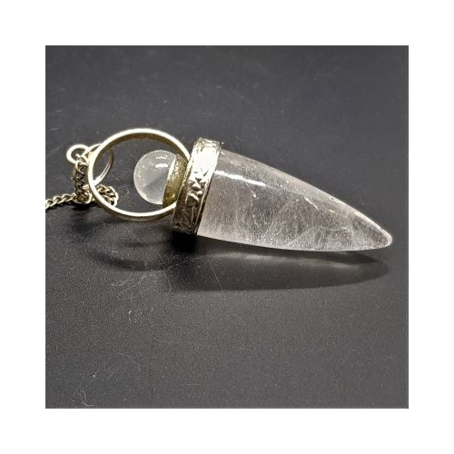 quartz bullet and ball pendulum close up