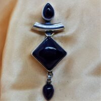 three stone amethyst in silver pendant