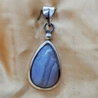 tear drop shaped blue lace agate in silver pendant