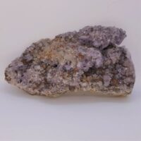 natural purple and clear fluorite cluster on matrix 1 with flash
