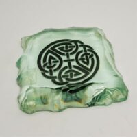 glass celtic paperweight with celtic knot design side view