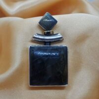 square and diamond set labradorite in silver pendant