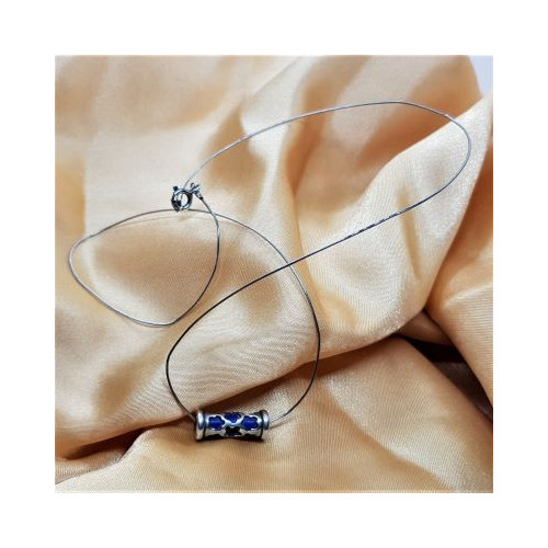 lapis lazuli tube bead inside silver flower pattern tube on silver wire necklace