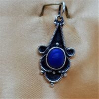 small fancy silver setting with lapis lazuli stone