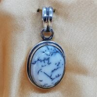 oval merlinite in silver pendant