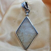 diamond shaped rainbow moonstone in silver pendant