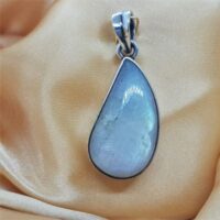 teardrop rainbow moonstone set in silver pendant