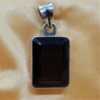 rectangular facetted smokey quartz in silver pendant