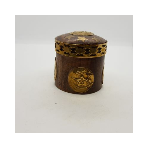 small round wood and brass pot with brass trim and star design