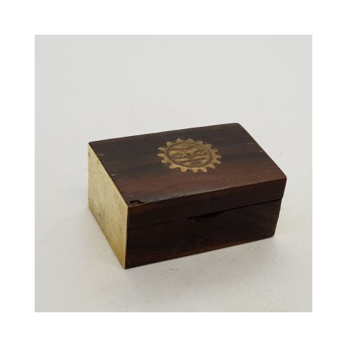 small wood and brass 'pill' box with brass end and sun design