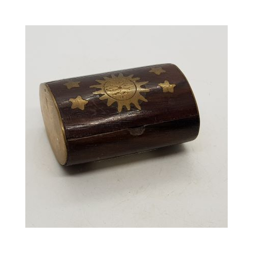 small wooden oval 'pill' box sun and stars design in brass with brass ends