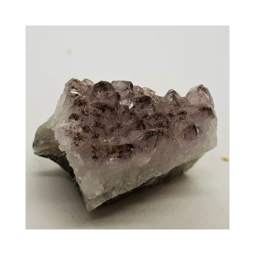 pale amethyst with inclusions side view 1