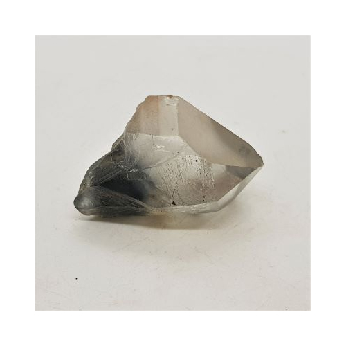 quartz point with blue inclusion reverse side view
