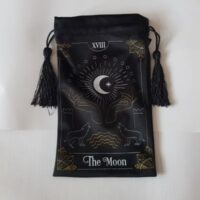 black tarot back with image of the Moon tarot card