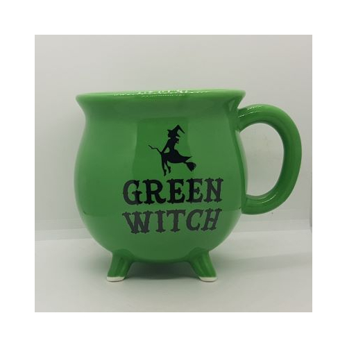 cauldron shaped mug green with black print witch on broomstick and word green witch