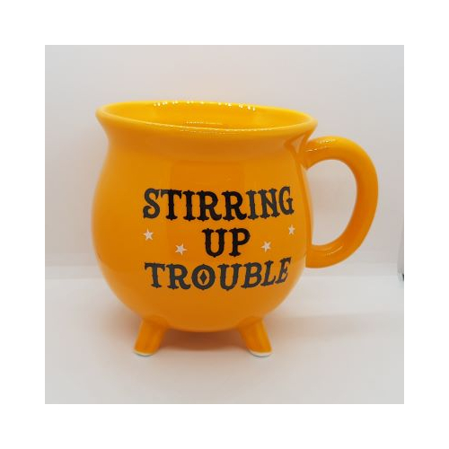 cauldron shaped mug orange with black print stirring up trouble