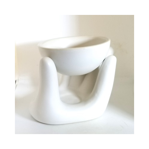 Always take care using oil burners do not allow the water in the bowl to boil away and never leave a lit candle unattended.
